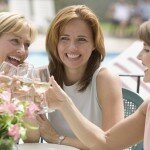 Women Toasting Wine Glasses